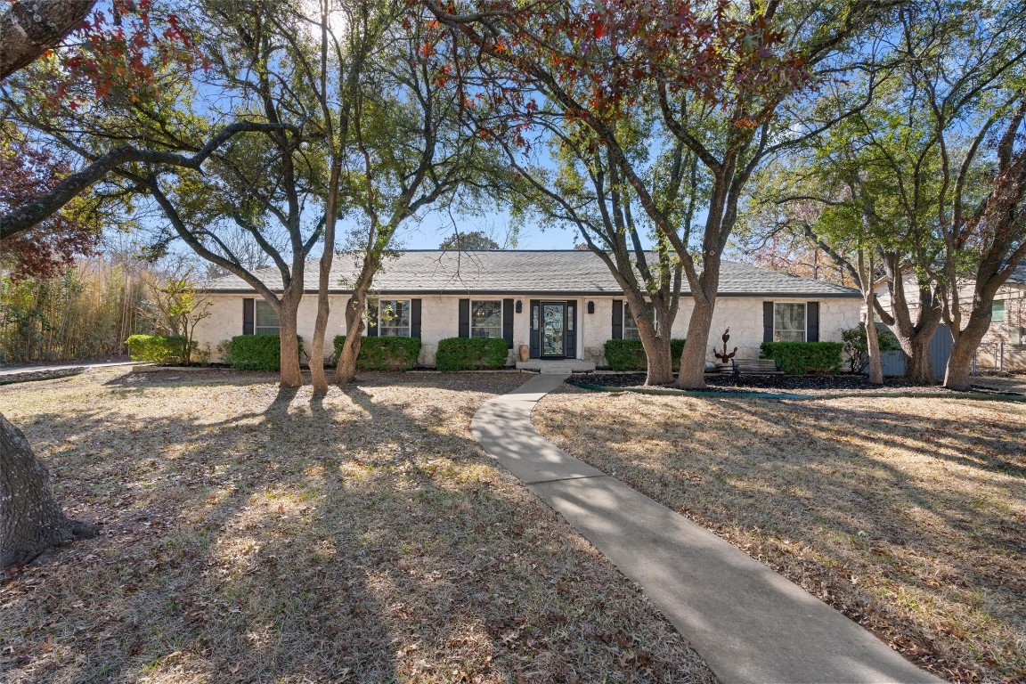 312 Ridgecrest Road Georgetown, TX 78628 - Photo 1 of 1 a front view of a house with a yard