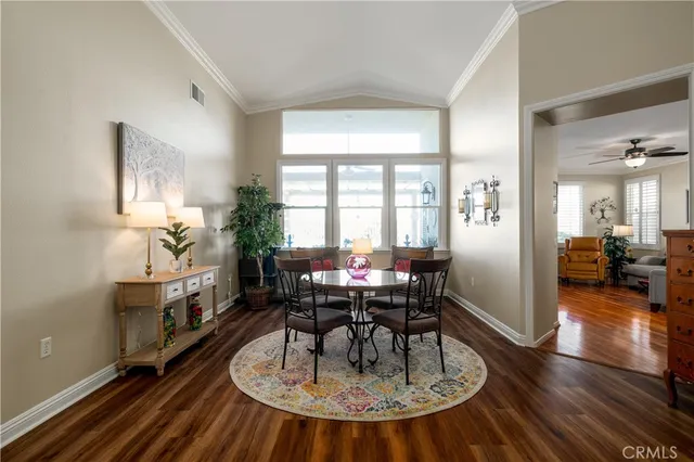 a kitchen with cabinets and stainless steel appliances