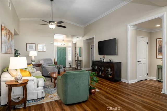 a kitchen with lots of counter top space and wooden floor