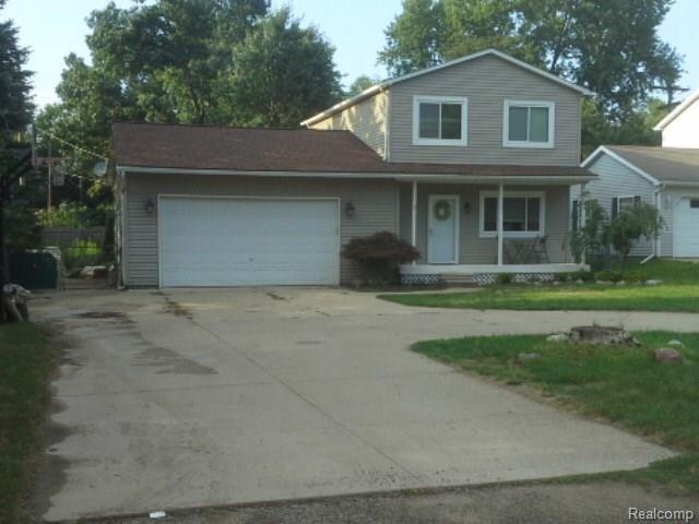 1381 Miller Road Lake Orion, MI 48362 - Photo 2 of 28 large circle drive w/ B ball hoop