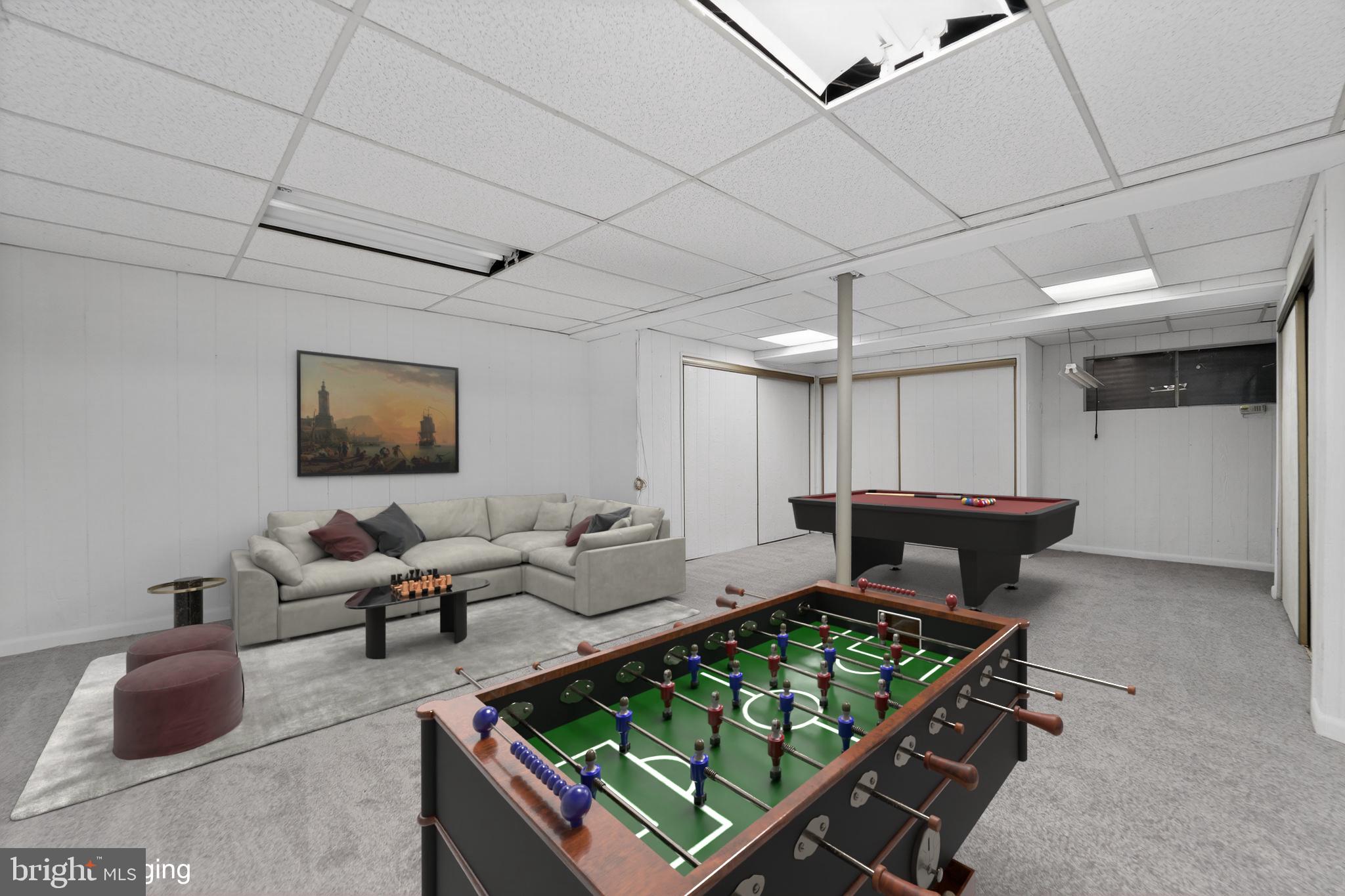 7012 Redmiles Road Laurel, MD 20707 - Photo 29 of 33 Spacious game room for endless fun.