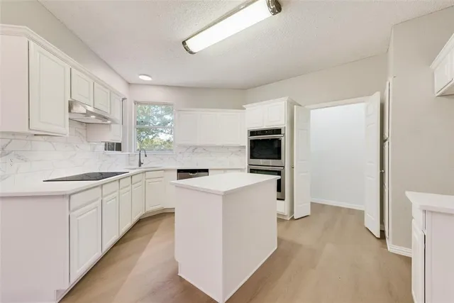 a very nice looking dining room with a wooden floor