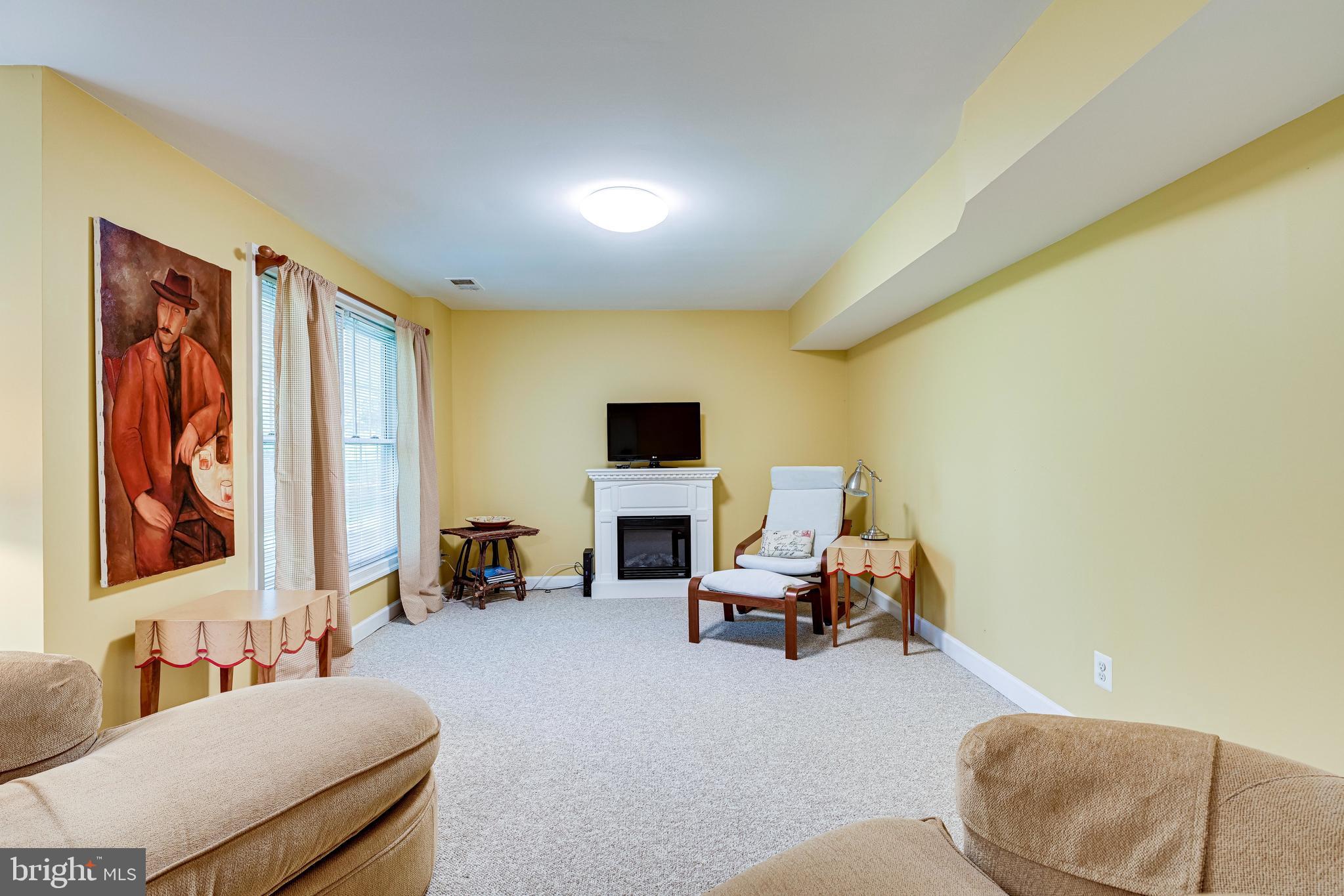 9728 Hidden Valley Road Vienna, VA 22181 - Photo 40 of 56 Large recreation room with double windows