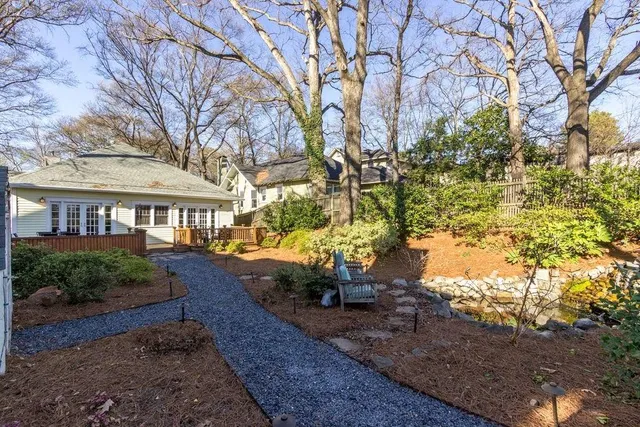 a view of a backyard of the house