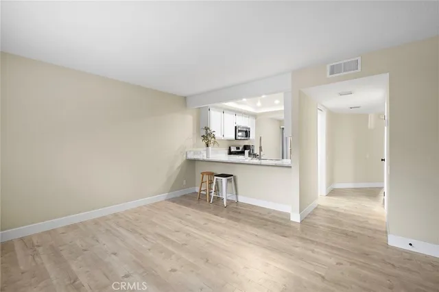 a view of kitchen and sink