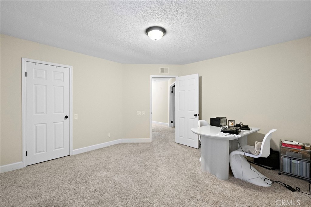 6 Fieldflower Irvine, CA 92614 - Photo 27 of 39 a room with a table and chairs