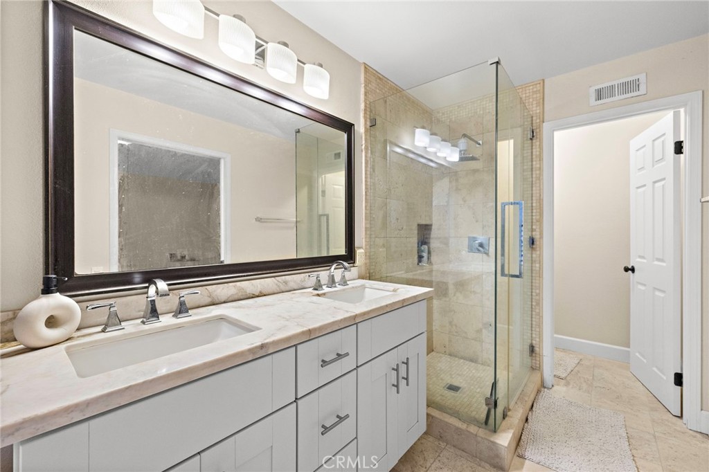 6 Fieldflower Irvine, CA 92614 - Photo 33 of 39 a bathroom with a granite countertop sink mirror and double
