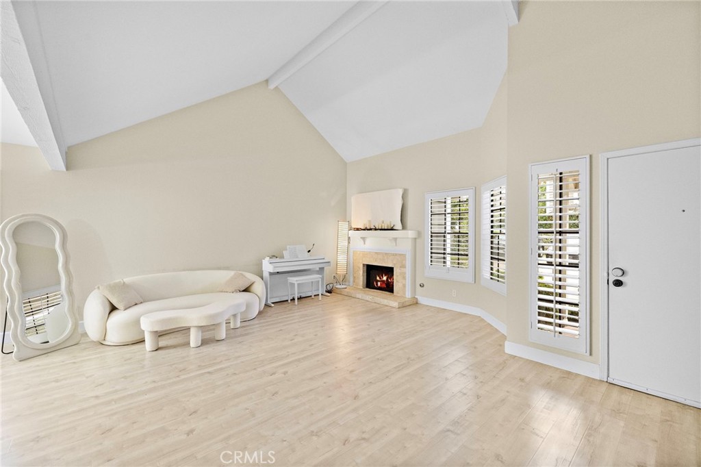 6 Fieldflower Irvine, CA 92614 - Photo 7 of 39 a spacious bedroom with a bed and a chair