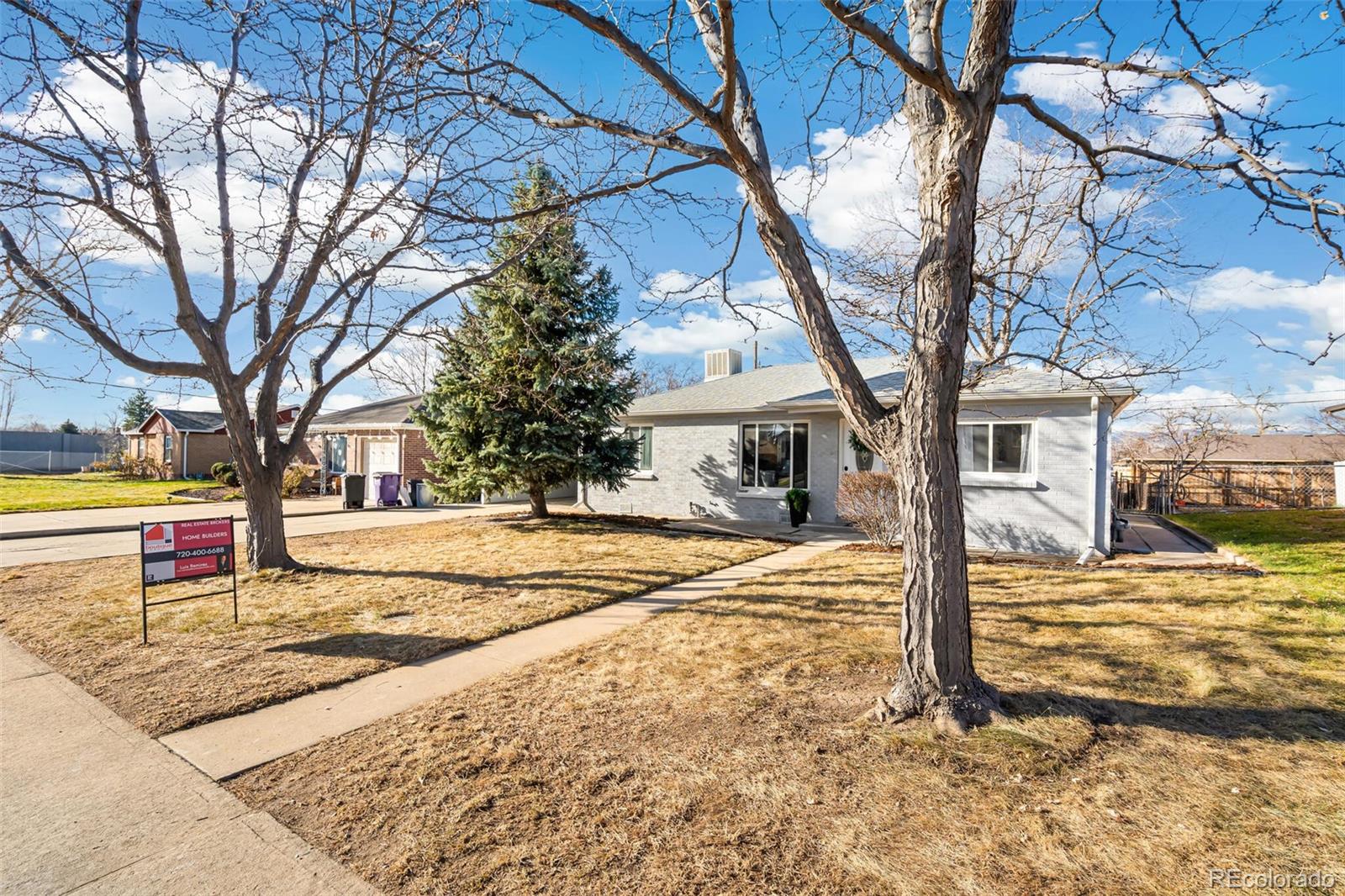 4831 Depew Street Denver, CO 80212 - Photo 2 of 35 a view of a house with snow on the road