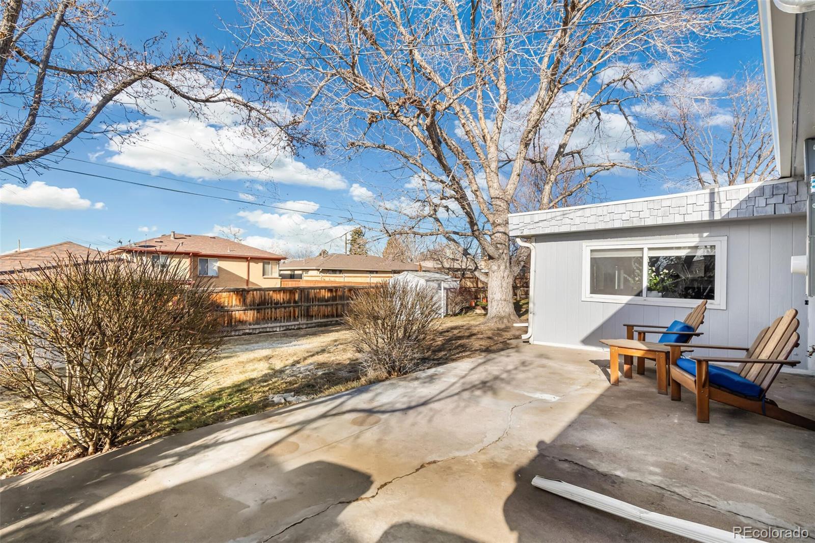 4831 Depew Street Denver, CO 80212 - Photo 3 of 35 a view of a patio with a yard