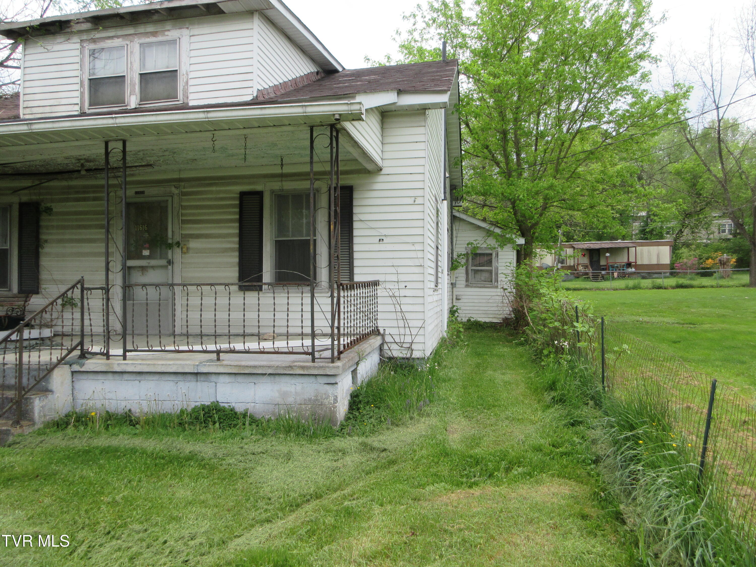 11616 Riverview Road Coeburn, VA 24230 - Photo 16 of 23 AREA BETWEEN OLD HOUSE AND PROPERTY LINE