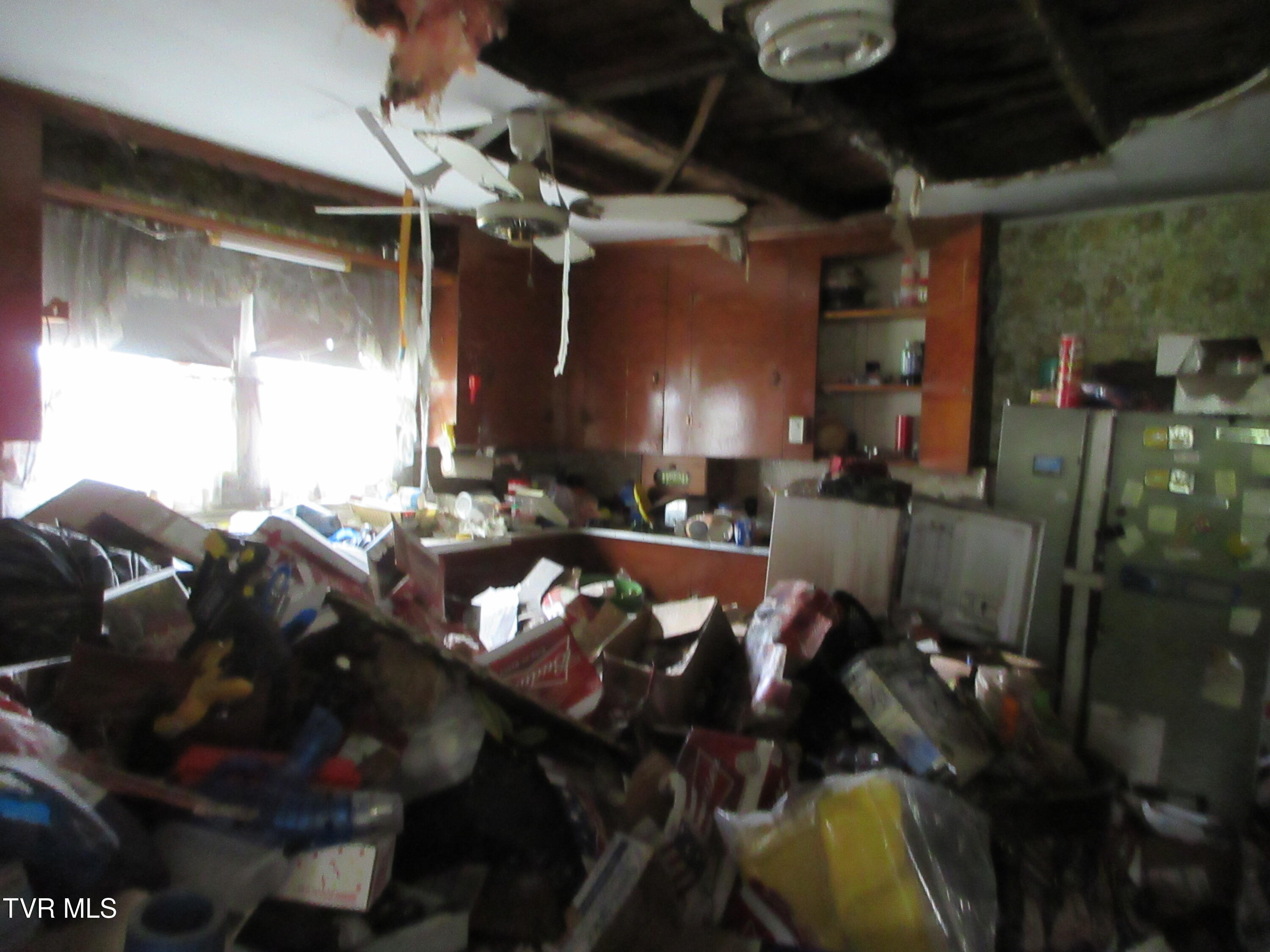 11616 Riverview Road Coeburn, VA 24230 - Photo 23 of 23 HOUSE KITCHEN TOWARD CABINETRY