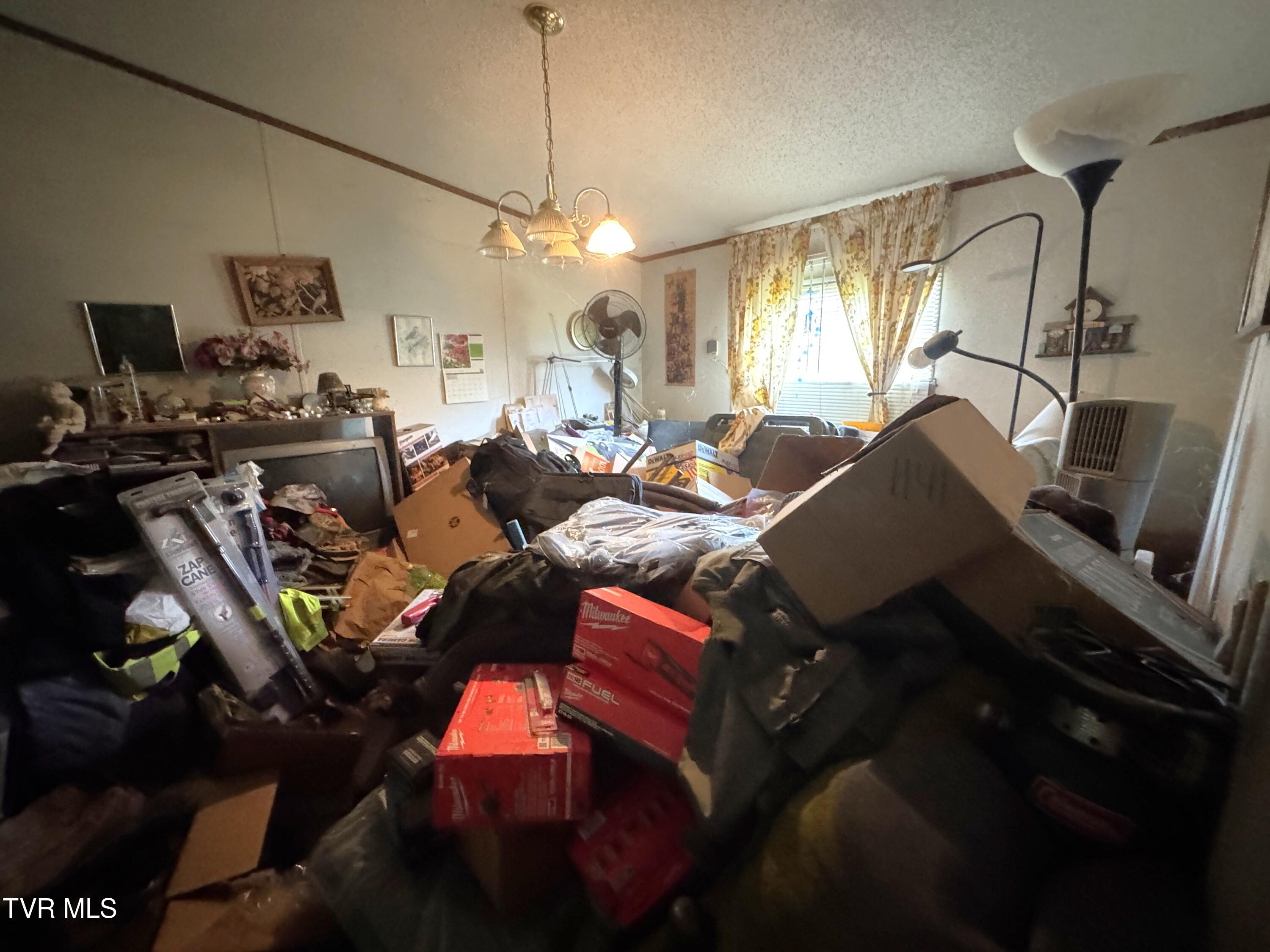 11616 Riverview Road Coeburn, VA 24230 - Photo 10 of 23 DOUBLEWIDE LIVING ROOM TOWARD FRONT DOOR