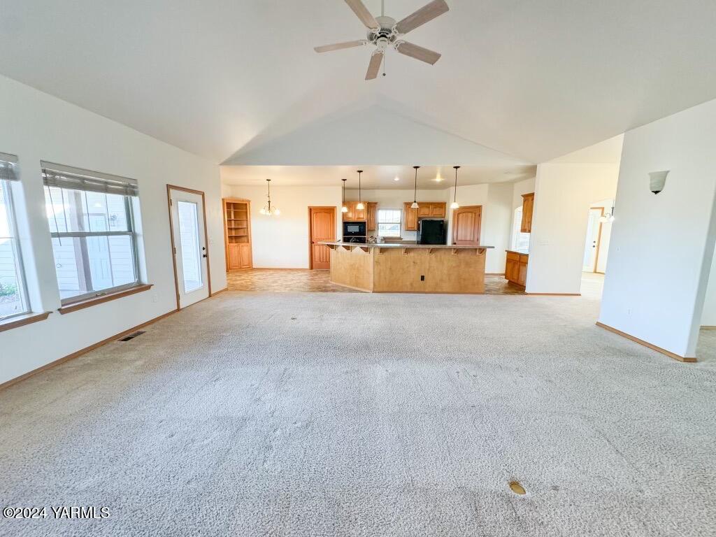 699 Alexander Road Sunnyside, WA 98944 - Photo 11 of 27 a view of a livingroom with furniture and a window