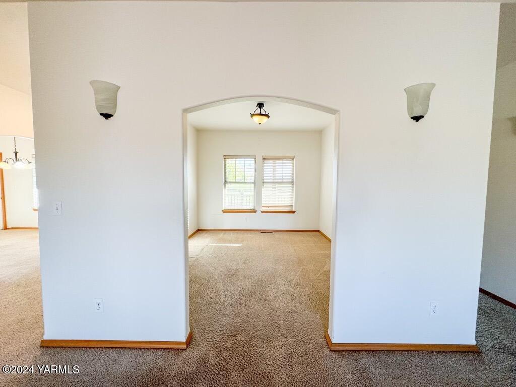 699 Alexander Road Sunnyside, WA 98944 - Photo 9 of 27 a view of an empty room with a window