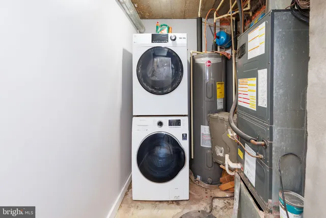 a close up view of a washer and dryer in a utility room