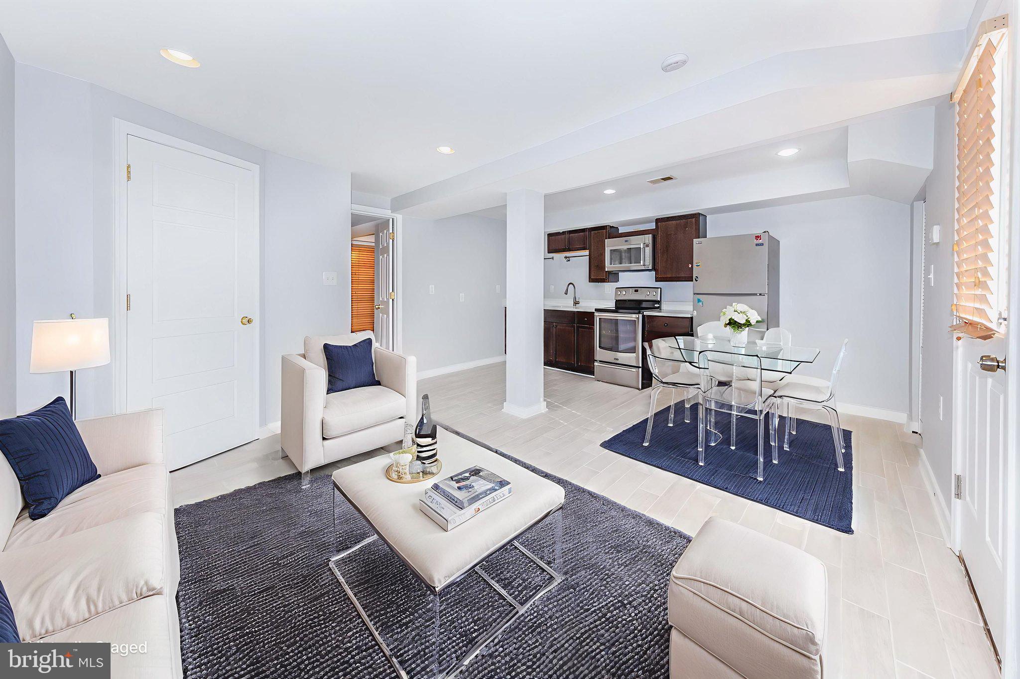 117 R Street Northwest, Unit 2 Washington, DC 20001 - Photo 2 of 35 Open living & kitchen area (virtually staged)