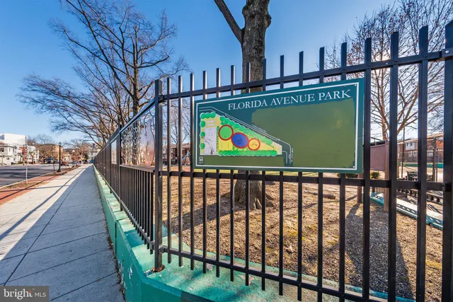 a view of swimming pool with outdoor seating