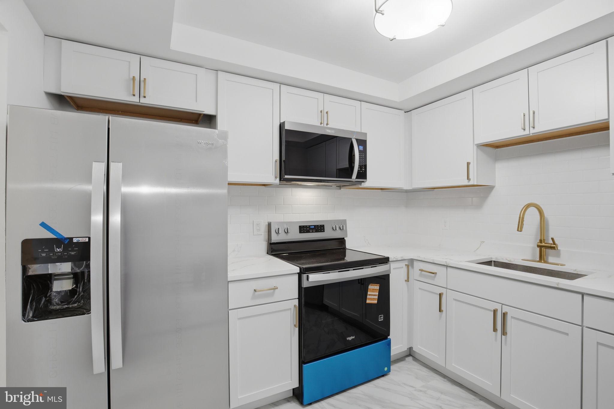 10028 Stedwick Road, Unit 102 Montgomery Village, MD 20886 - Photo 3 of 42 NEW stunning kitchen