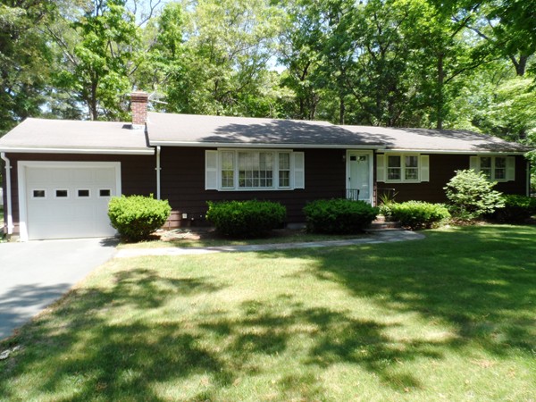 25 Eaton Road Framingham, MA 01701 - Photo 1 of 11 a front view of a house with garden
