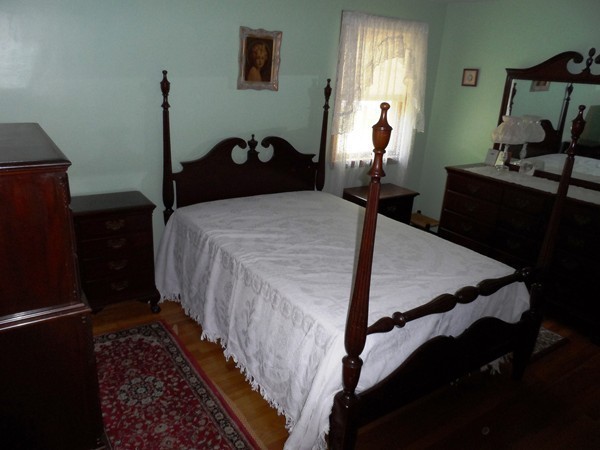 25 Eaton Road Framingham, MA 01701 - Photo 5 of 11 a bed room with a bed and a window