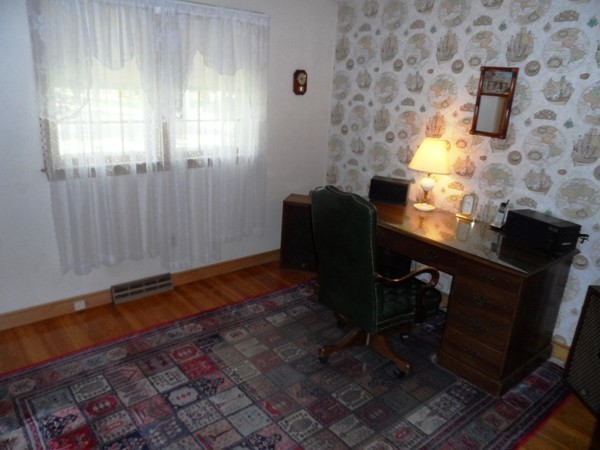 25 Eaton Road Framingham, MA 01701 - Photo 6 of 11 a workspace with furniture and a window
