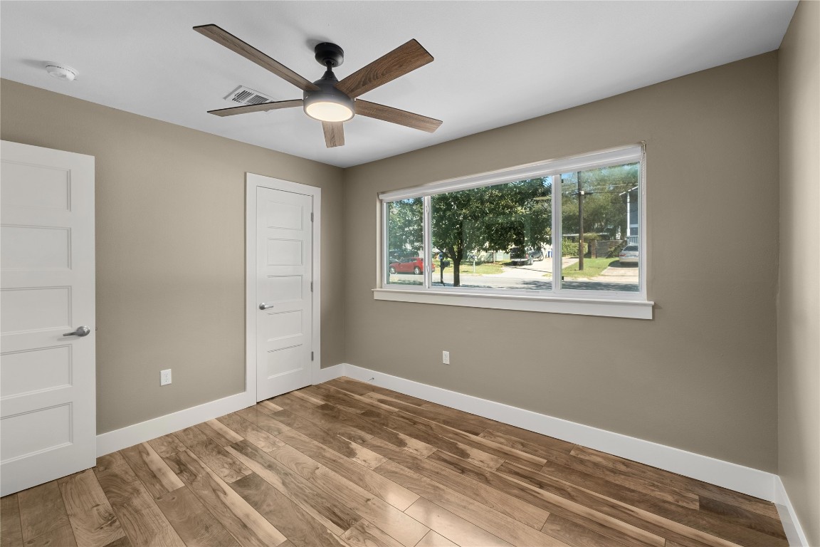 1204 Eleanor Street Austin, TX 78721 - Photo 20 of 26 a view of a livingroom with a ceiling fan and window