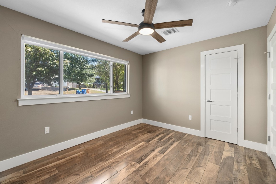 1204 Eleanor Street Austin, TX 78721 - Photo 21 of 26 a view of room with window and ceiling fan