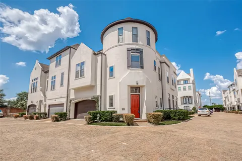 a front view of a multi story residential apartment building