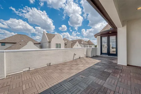 a view of a living room with a large window