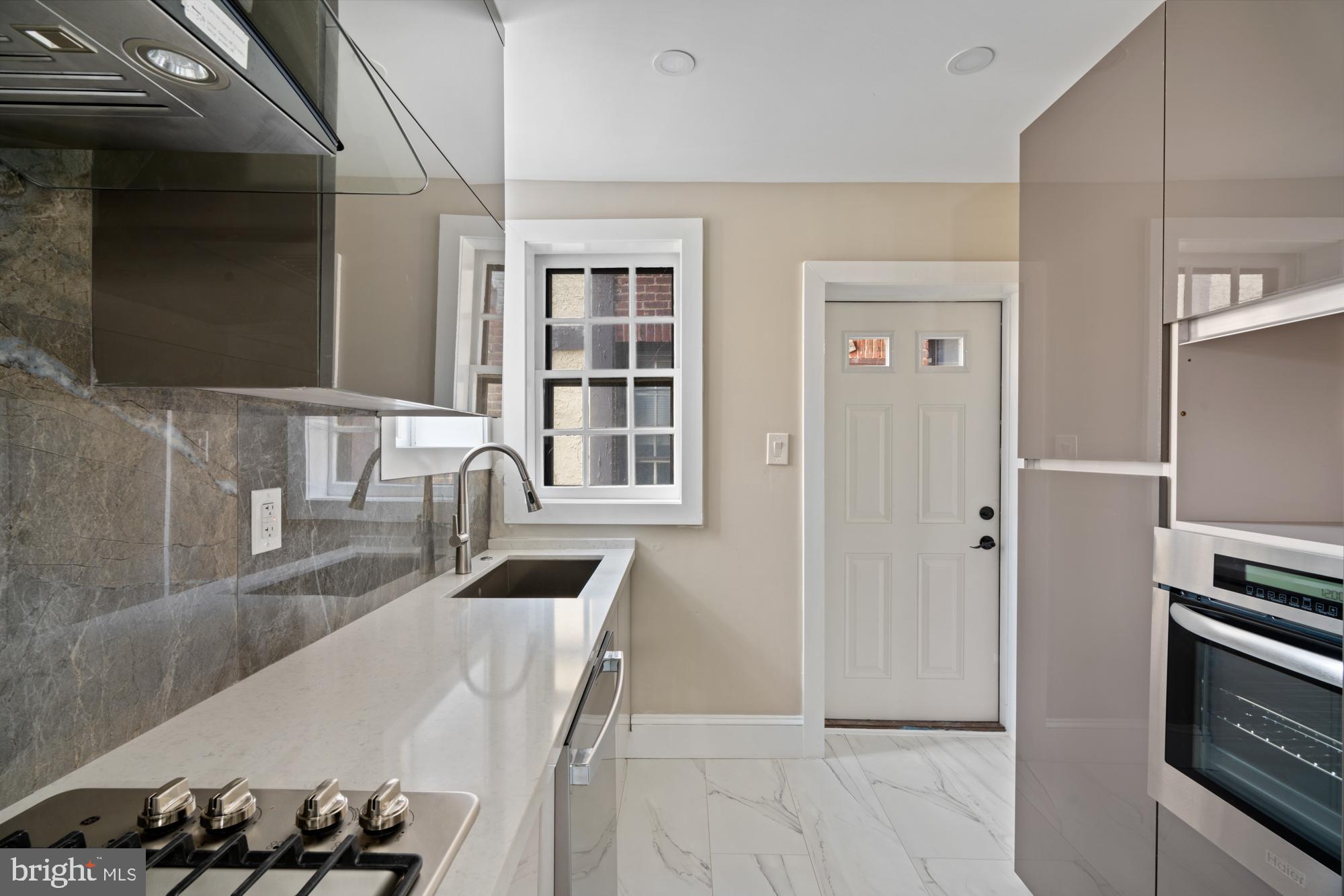 415 City Avenue, Unit I2 Merion Station, PA 19066 - Photo 25 of 35 a view of a kitchen filled with furniture and a window