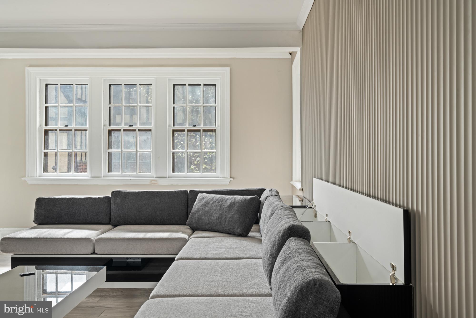 415 City Avenue, Unit I2 Merion Station, PA 19066 - Photo 29 of 35 a living room with furniture and a window