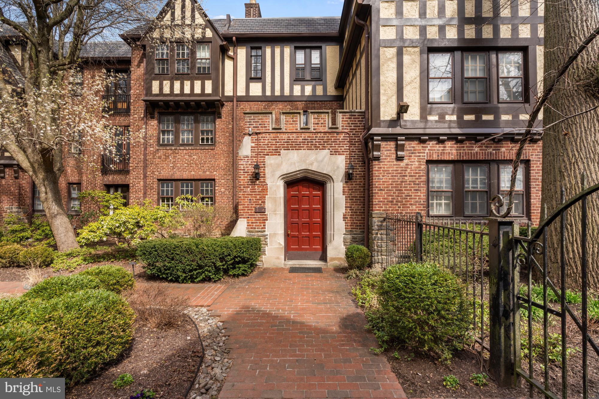 415 City Avenue, Unit I2 Merion Station, PA 19066 - Photo 33 of 35 a front view of a house with a yard and garage