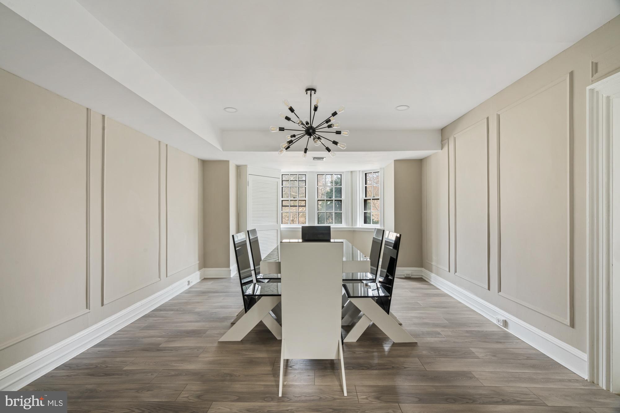 415 City Avenue, Unit I2 Merion Station, PA 19066 - Photo 6 of 35 a view of a dining room with furniture window and wooden floor