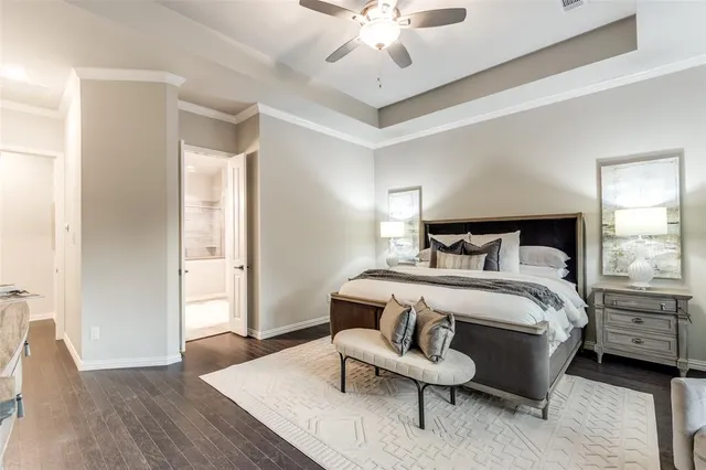 a bedroom with a bed and a chair