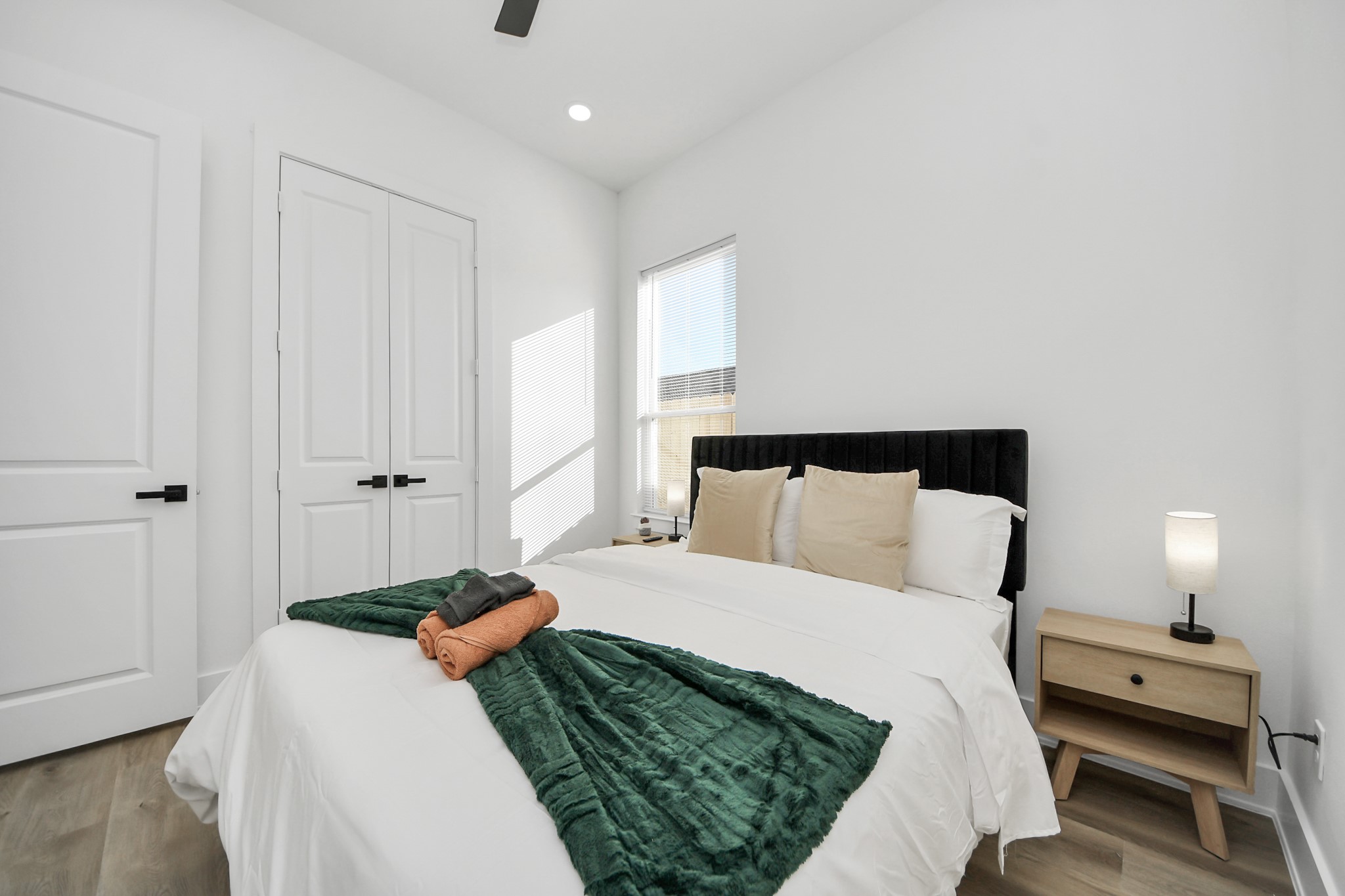 3909 Maggie Street Houston, TX 77051 - Photo 25 of 49 a bedroom with a bed and a night stand