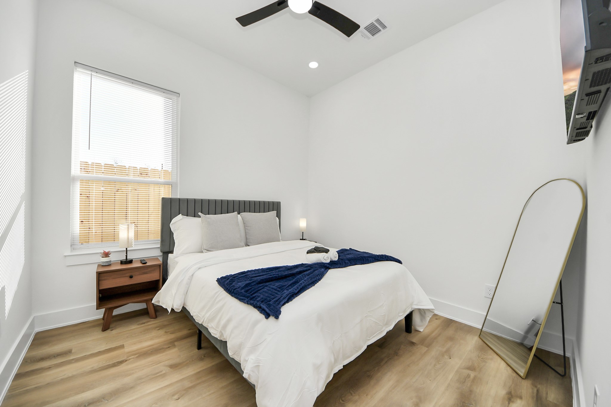 3909 Maggie Street Houston, TX 77051 - Photo 29 of 49 a bedroom with a bed and a window