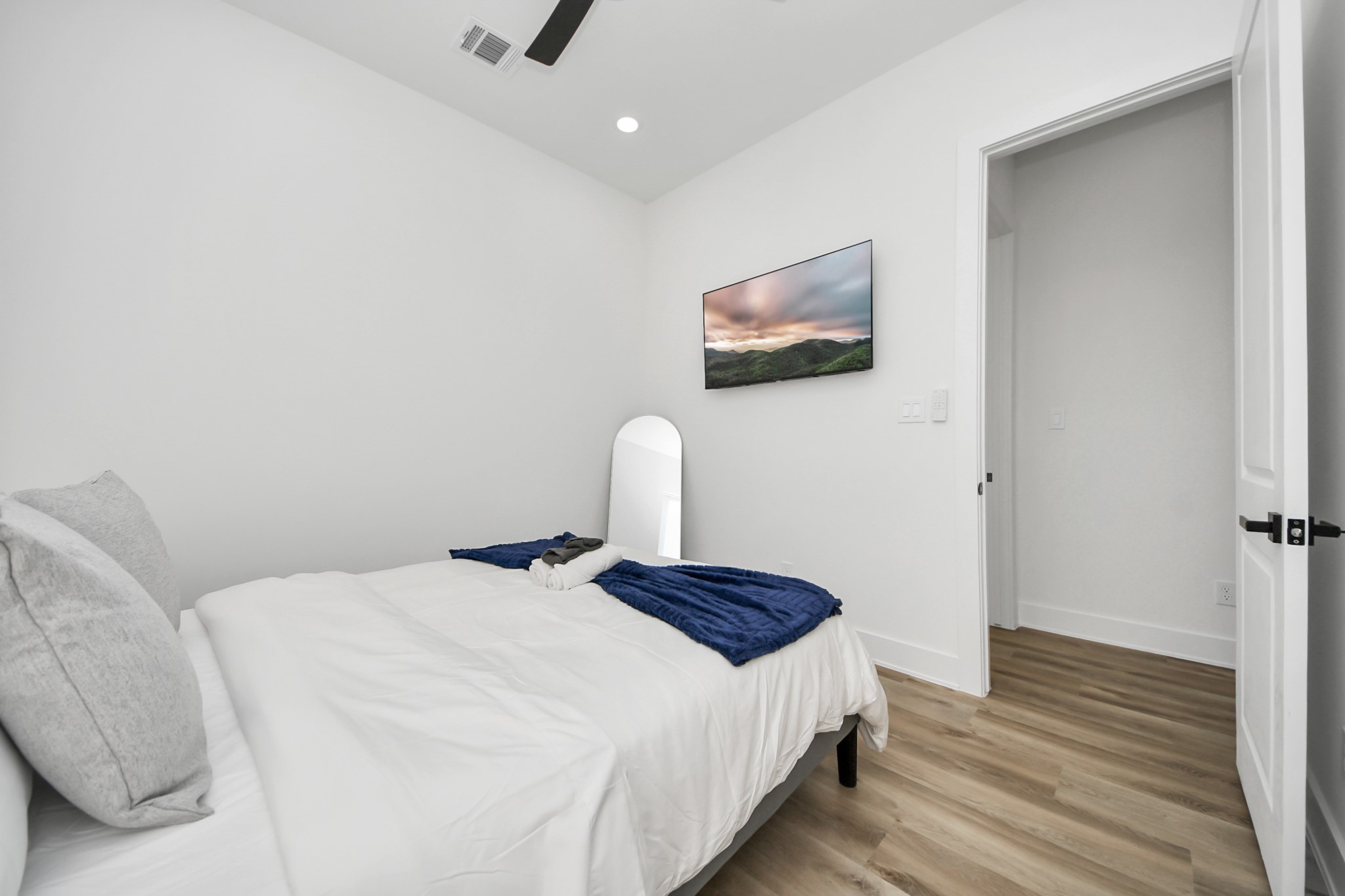 3909 Maggie Street Houston, TX 77051 - Photo 30 of 49 a bedroom with a bed and a mirror