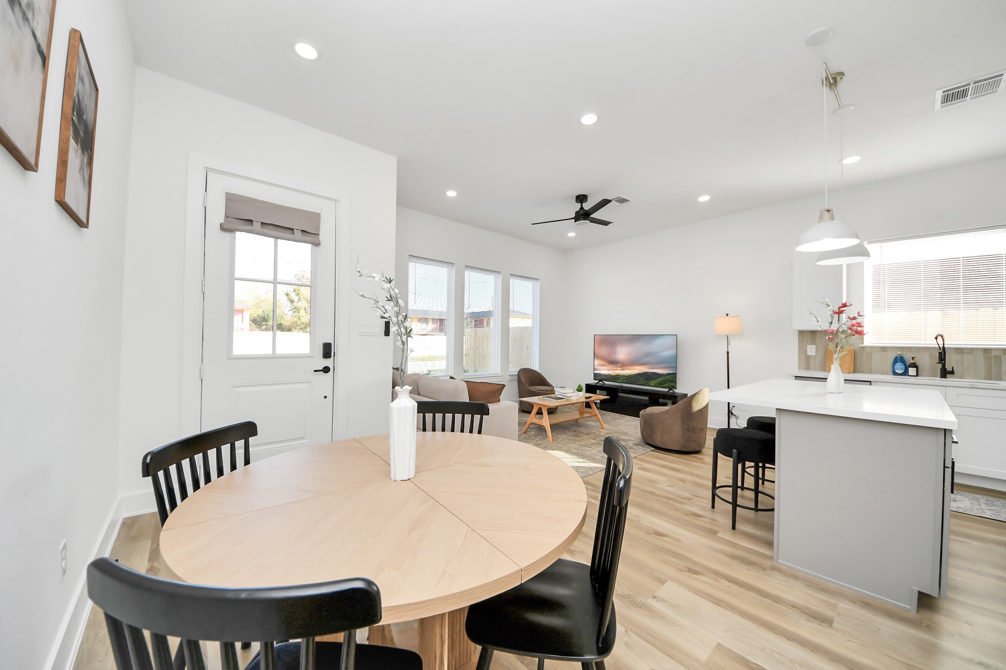 3909 Maggie Street Houston, TX 77051 - Photo 3 of 49 a large kitchen with a table and chairs