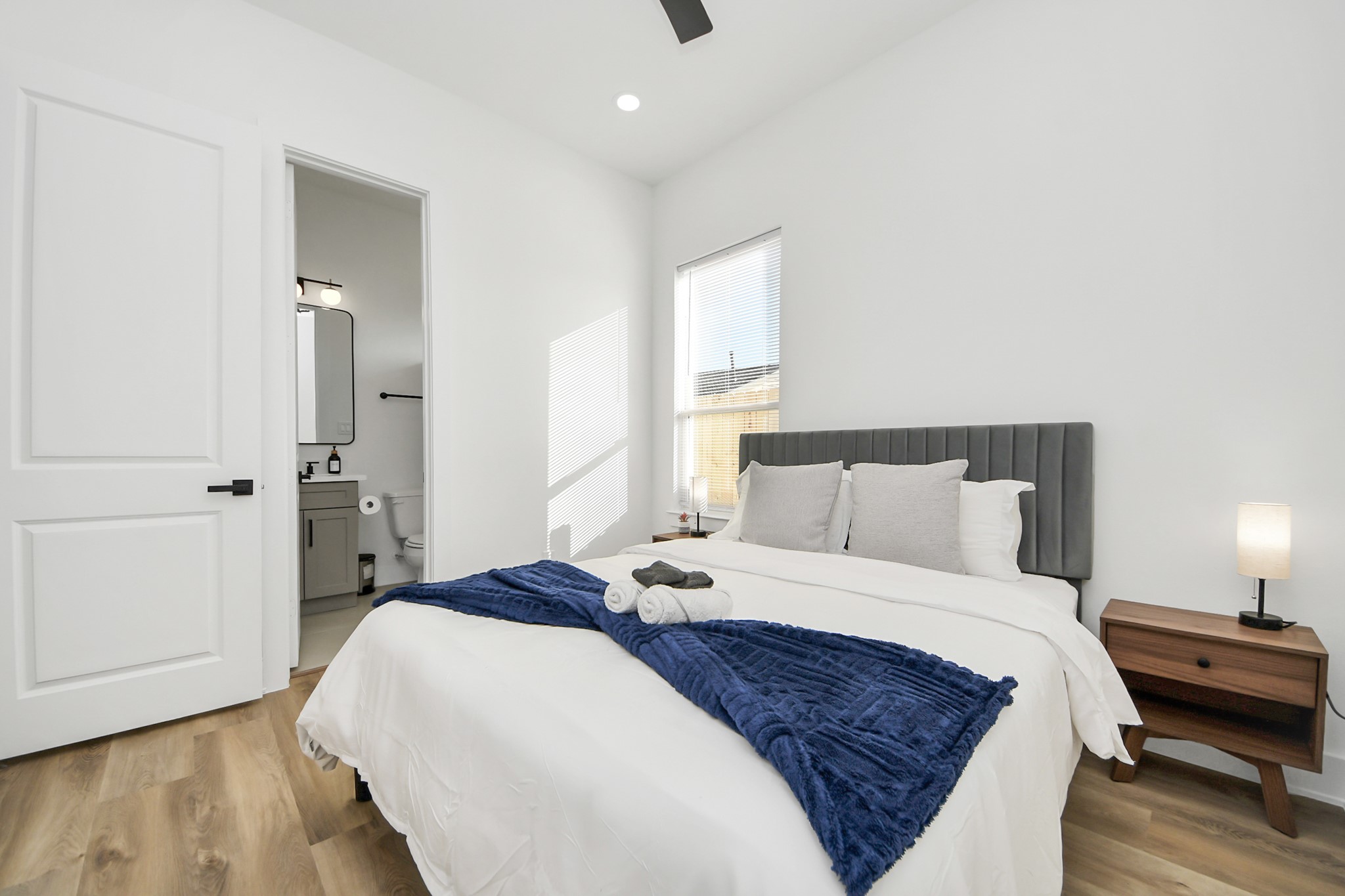 3909 Maggie Street Houston, TX 77051 - Photo 31 of 49 a bedroom with a bed and wooden floor