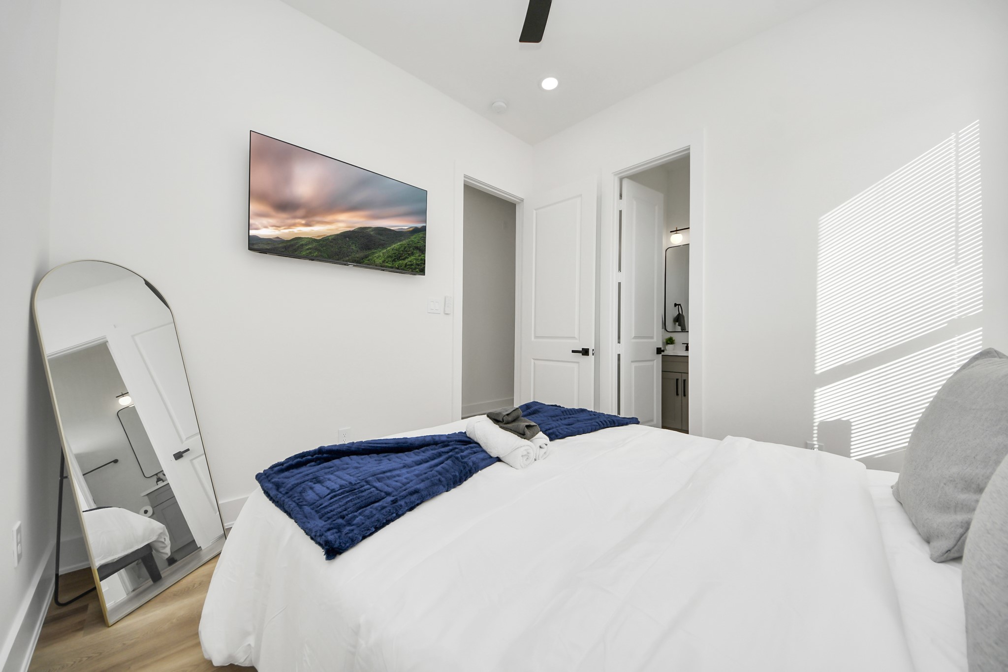 3909 Maggie Street Houston, TX 77051 - Photo 32 of 49 a bedroom with a bed and a flat screen tv