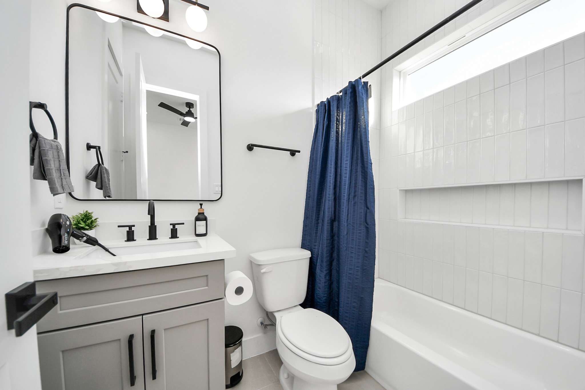 3909 Maggie Street Houston, TX 77051 - Photo 38 of 49 a bathroom with a sink a toilet a mirror and shower