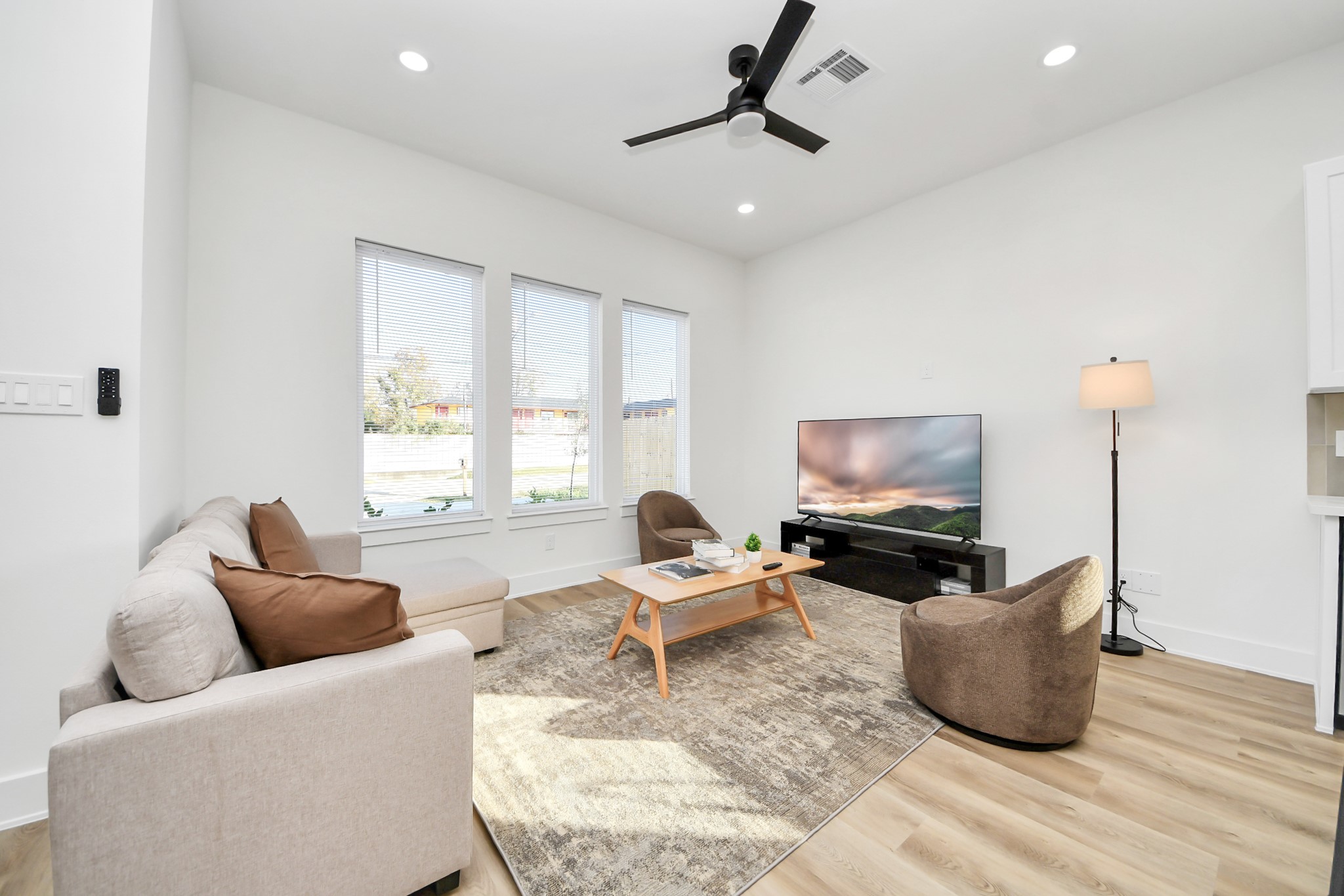 3909 Maggie Street Houston, TX 77051 - Photo 4 of 49 a living room with furniture and a flat screen tv