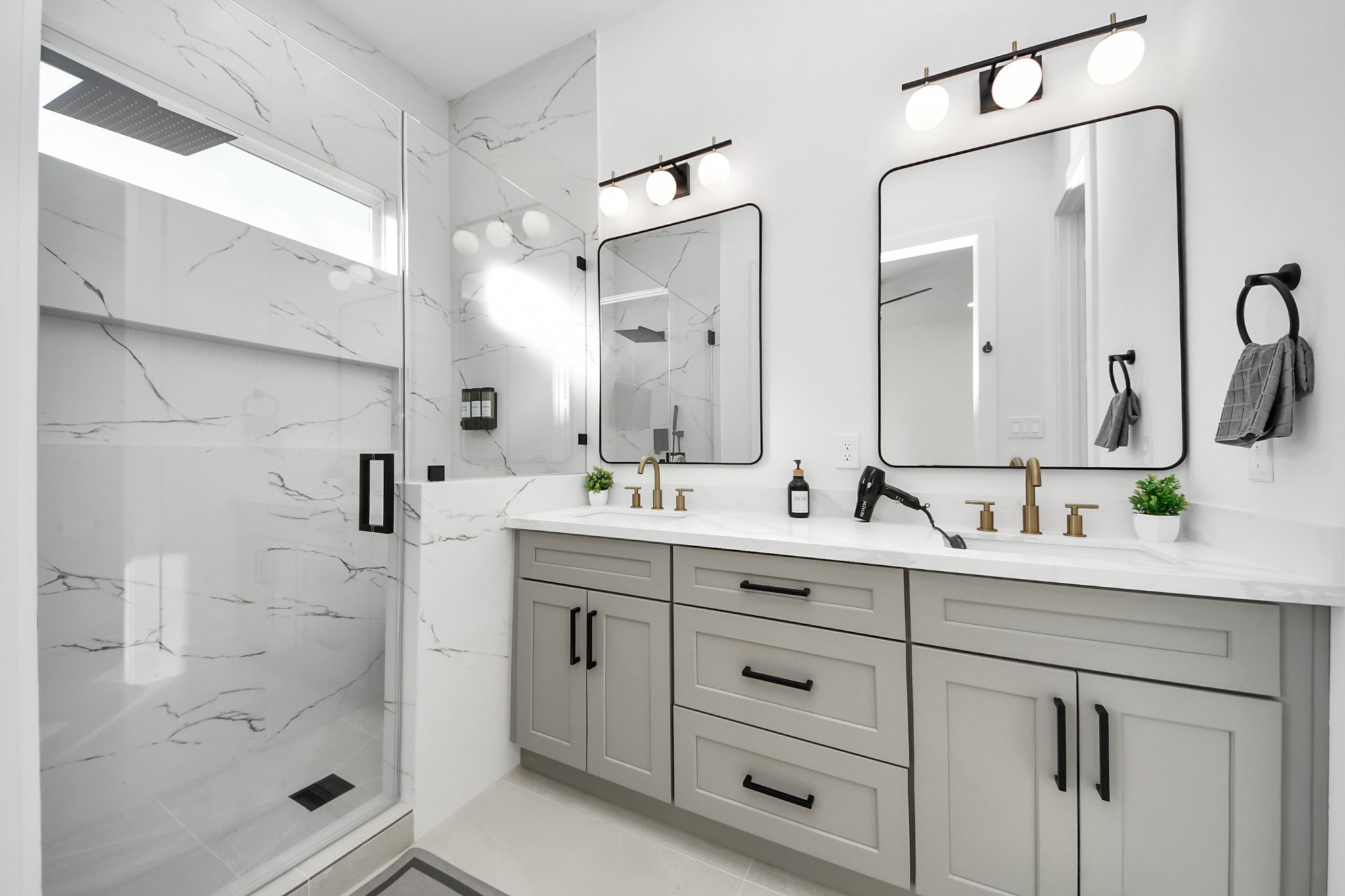 3909 Maggie Street Houston, TX 77051 - Photo 45 of 49 a bathroom with a shower sink and mirror