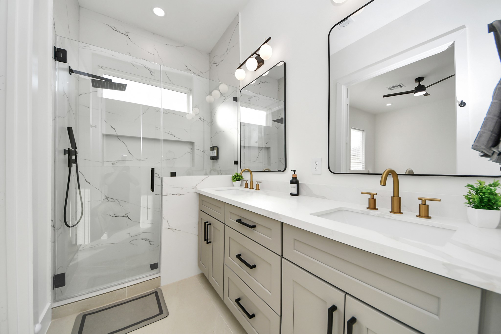 3909 Maggie Street Houston, TX 77051 - Photo 46 of 49 a bathroom with a double vanity sink mirror double and shower
