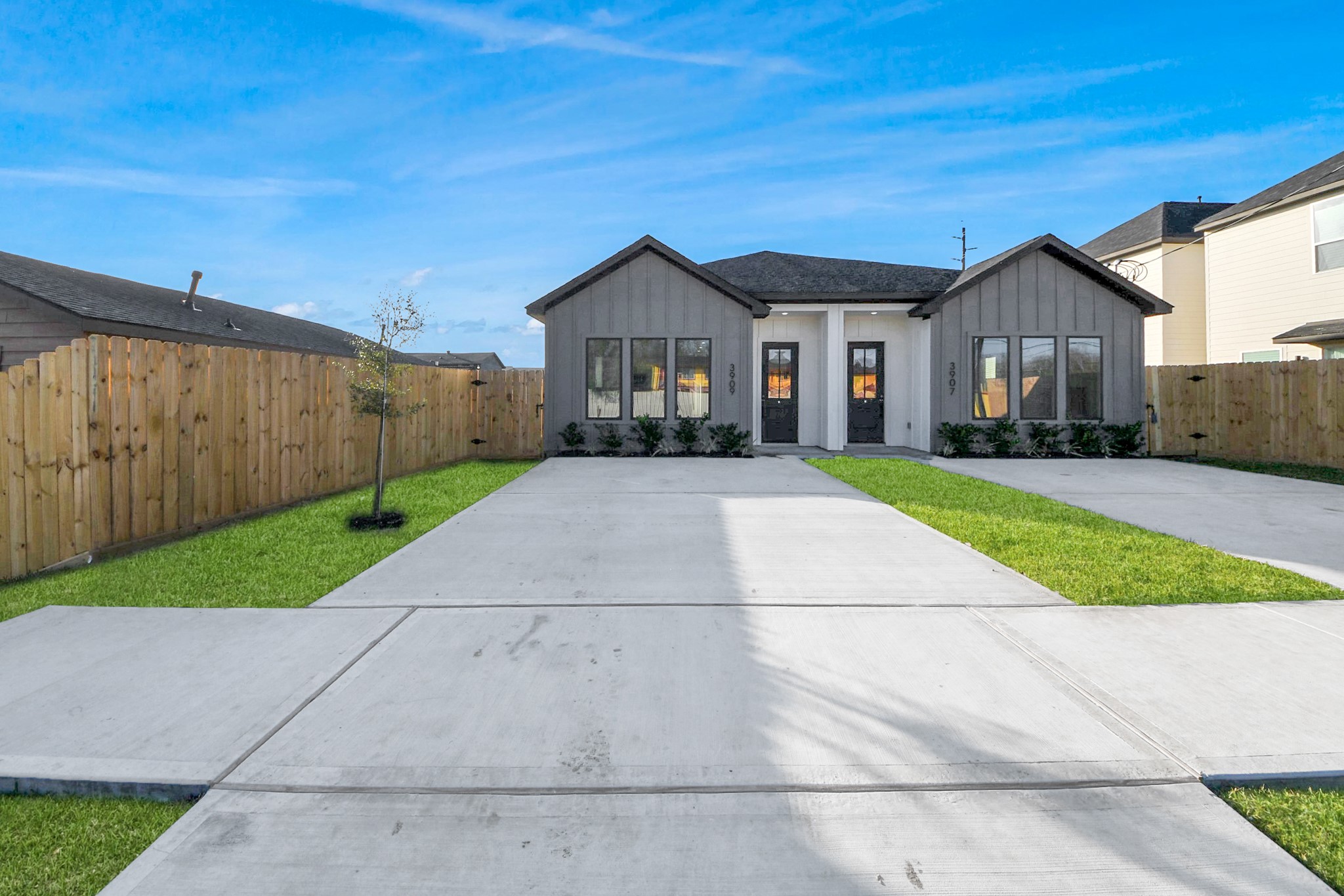 3909 Maggie Street Houston, TX 77051 - Photo 49 of 49 a front view of a house with a yard and garage