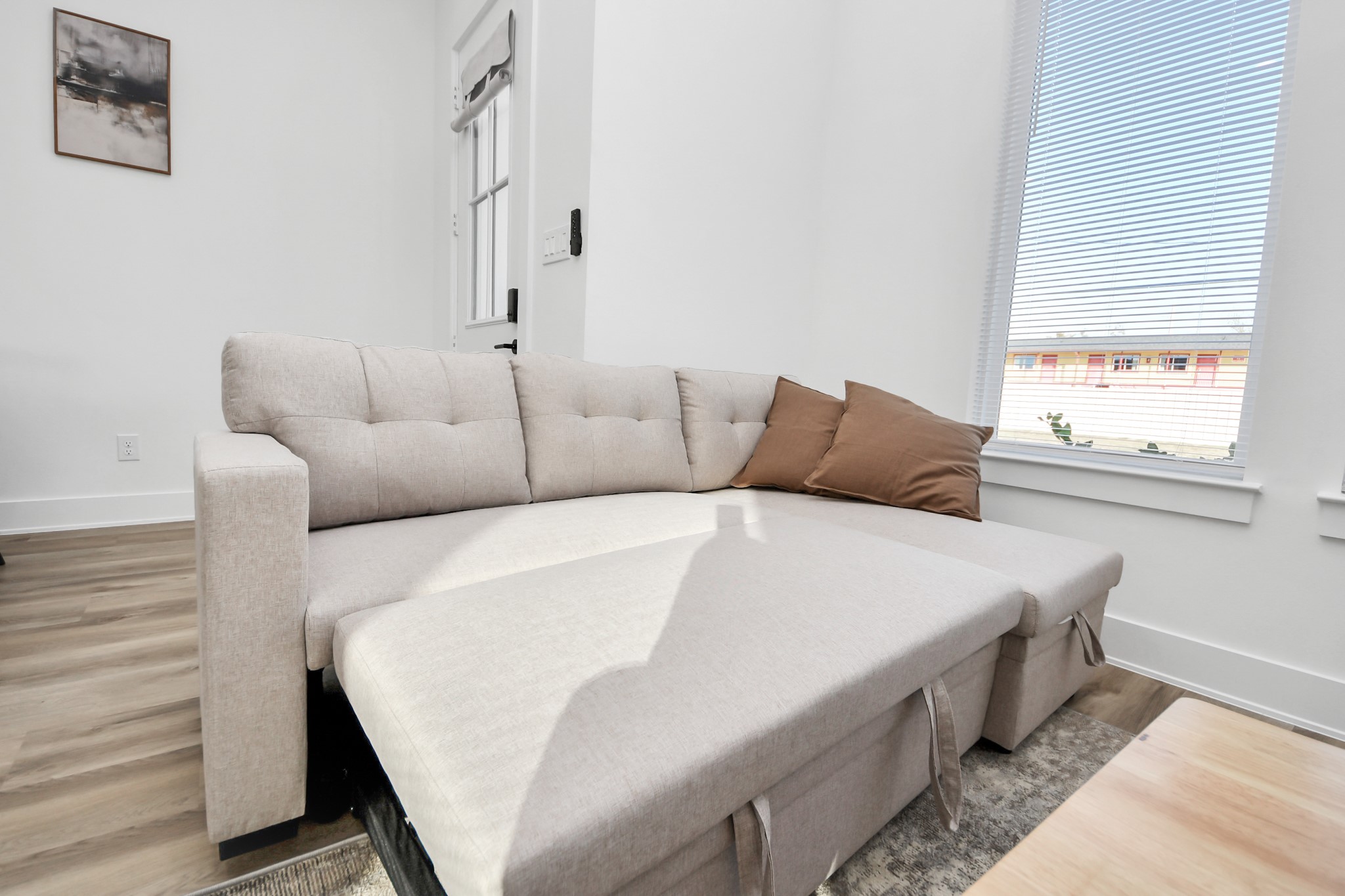 3909 Maggie Street Houston, TX 77051 - Photo 10 of 49 a bed sitting in a bedroom next to a window