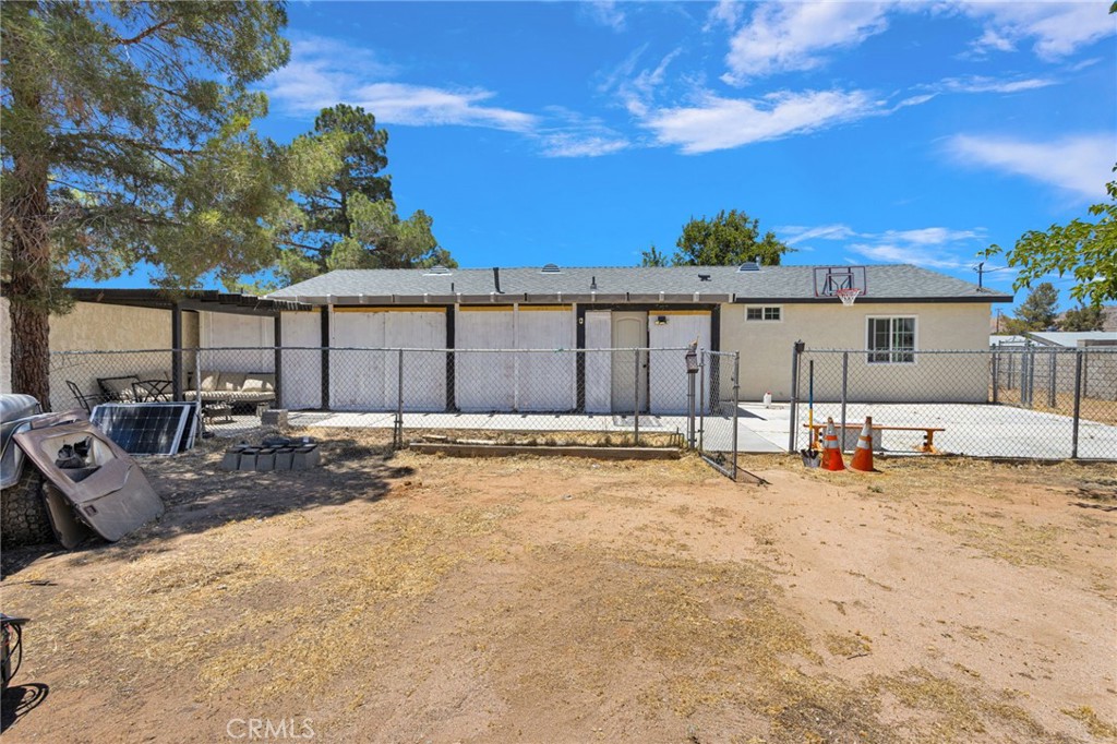 15471 Washoan Road Apple Valley, CA 92307 - Photo 30 of 38 a view of a house with swimming pool in front of house