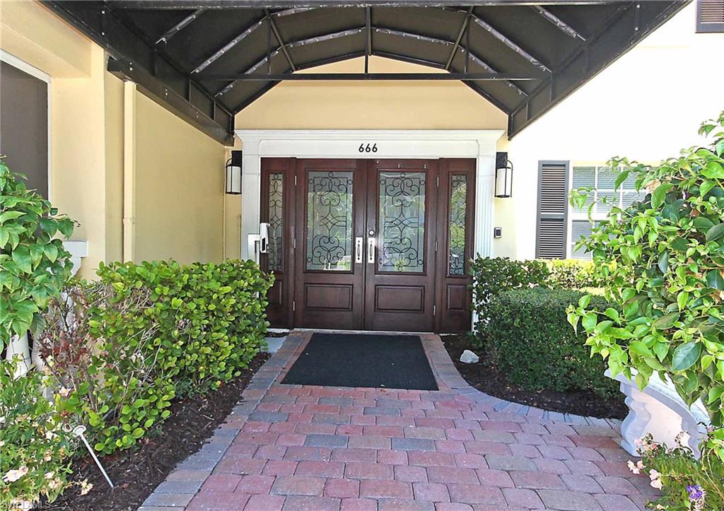 666 3rd Street South, Unit 201 Naples, FL 34102 - Photo 16 of 19 a view of a porch with garden