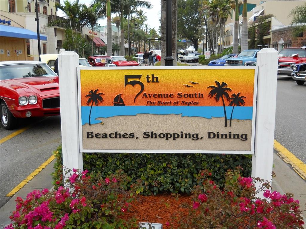 666 3rd Street South, Unit 201 Naples, FL 34102 - Photo 17 of 19 a sign on the side of a building